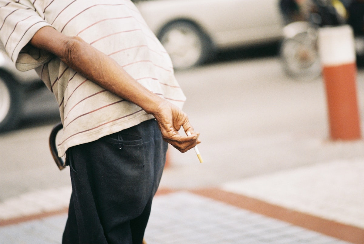 Some old dude, smoking cigarettes